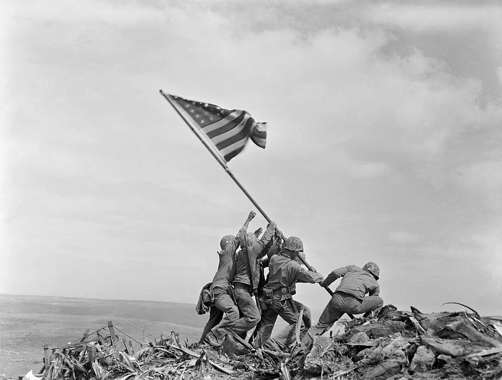 Raising the Flag on Iwo Jima is an iconic photograph of six Marines raising the U.S. flag atop Mount Suribachi during the Battle of Iwo Jima in the final stages of the Pacific War. Sergeant Michael Strank, originally from Czechoslovakia, was killed in action during the battle.